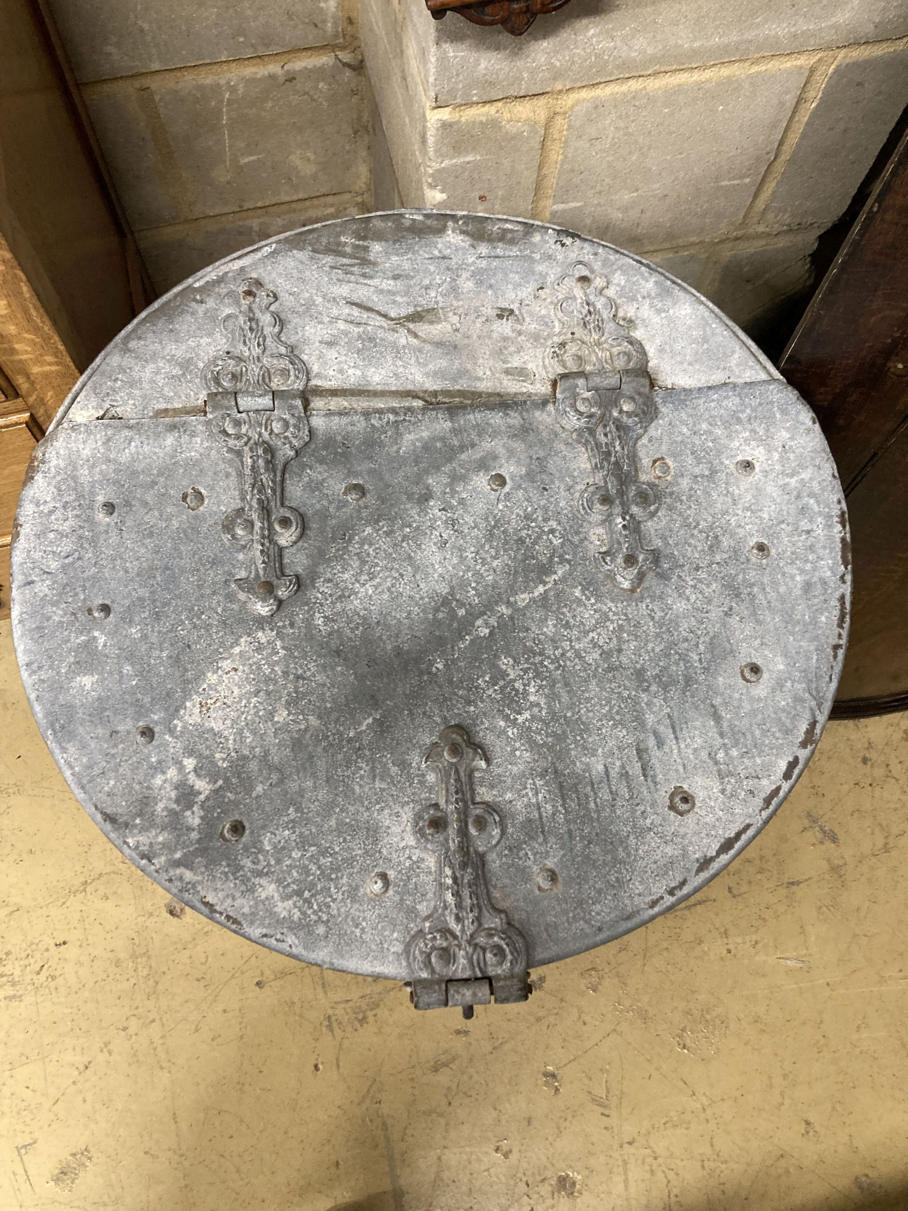 A large Victorian circular galvanised lidded barrel, 66cm high, 58cm diameter